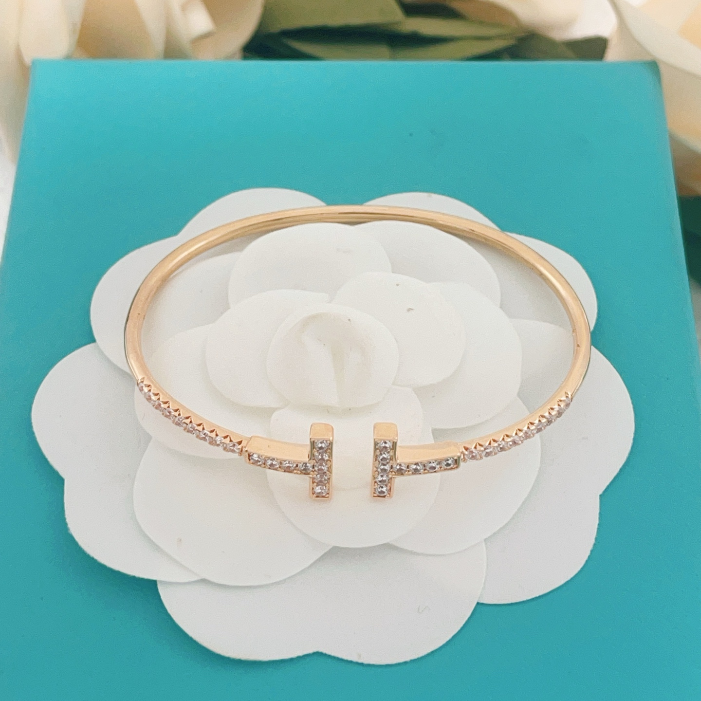 Tiffany T Wire bracelet 18k gold 18k rose gold sterling silver with clear diamond accents 17cm inner circumference