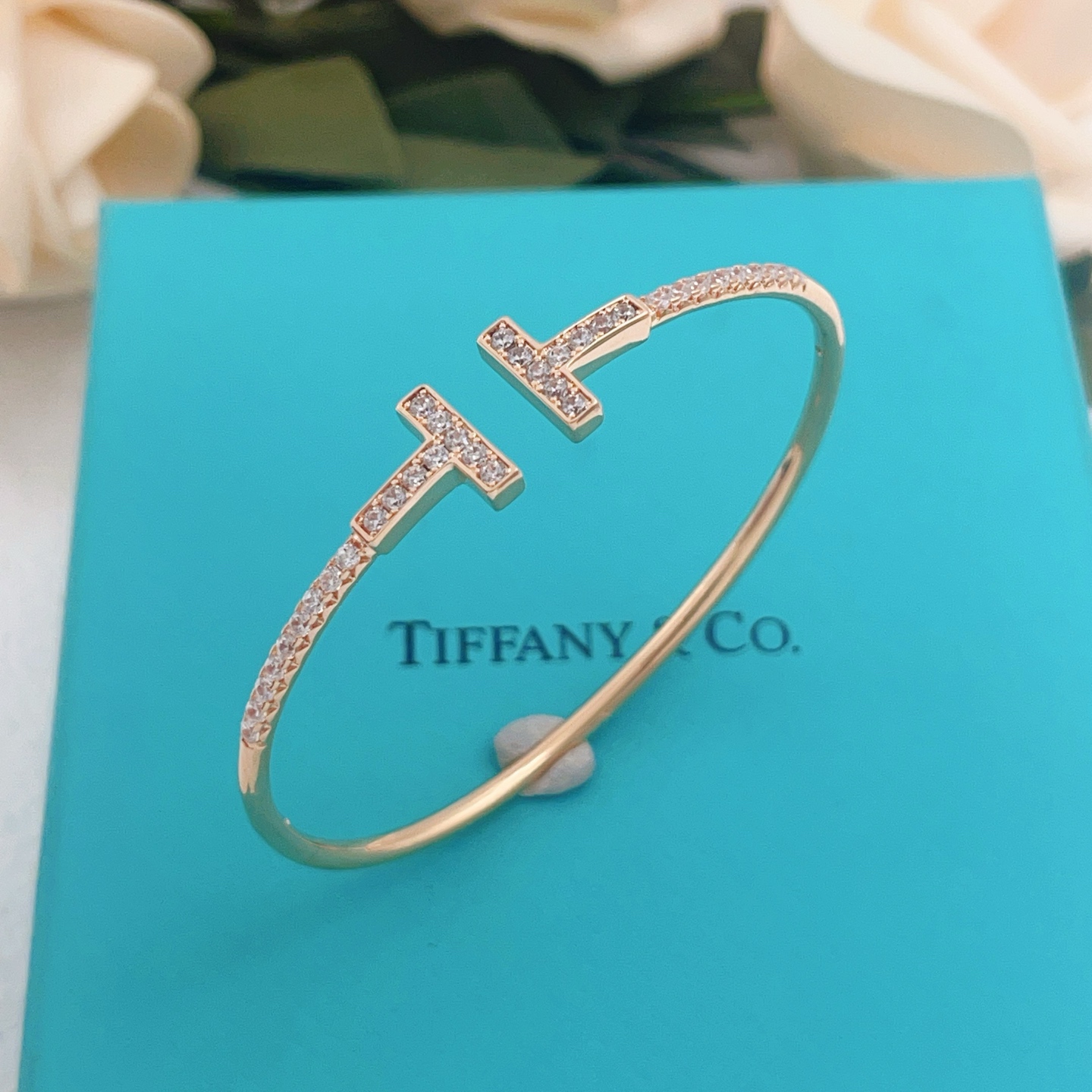 Tiffany T Wire bracelet 18k gold 18k rose gold sterling silver with clear diamond accents 17cm inner circumference