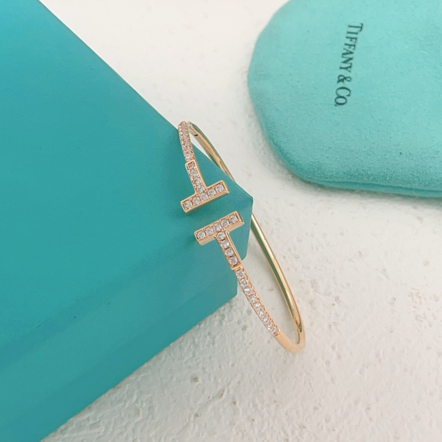 Tiffany T Wire bracelet 18k gold 18k rose gold sterling silver with clear diamond accents 17cm inner circumference