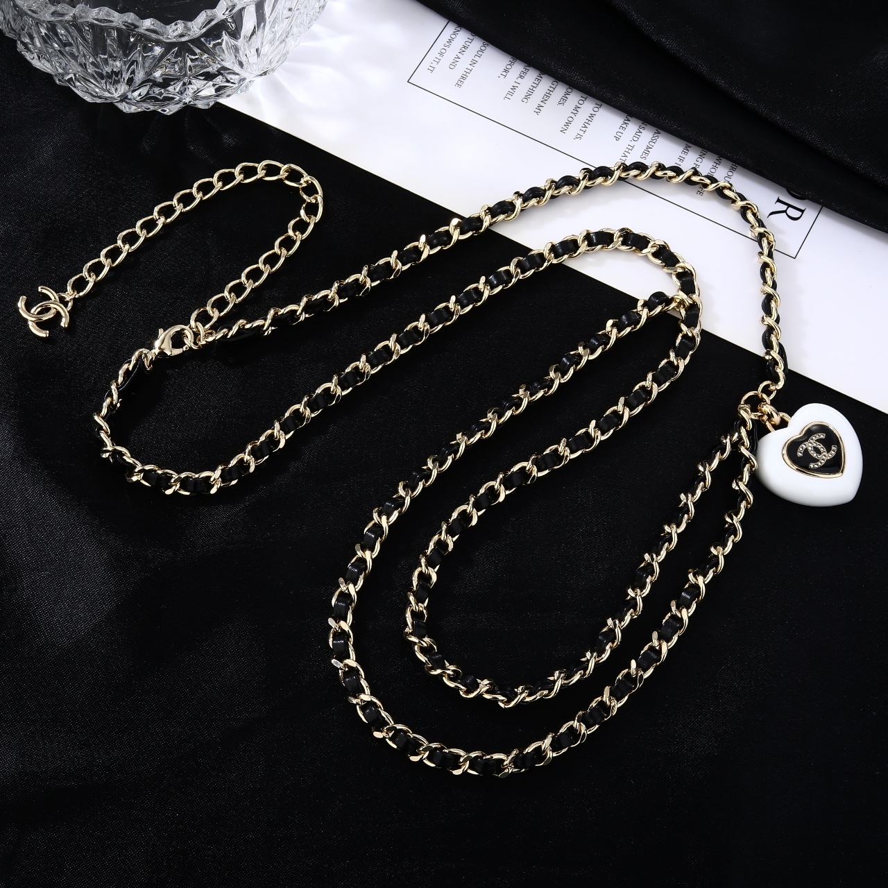 Chanel Goose Heart CC Pendant Waist Chain necklace Gold-tone metal black leather white resin heart pendant black enamel clear crystal accents 80cm with 10cm extender