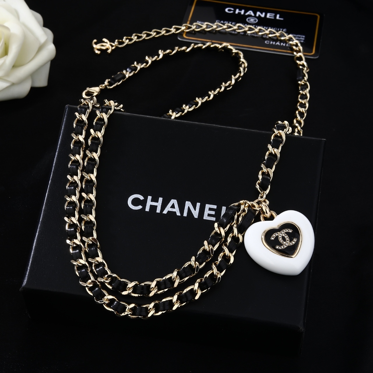 Chanel Goose Heart CC Pendant Waist Chain necklace Gold-tone metal black leather white resin heart pendant black enamel clear crystal accents 80cm with 10cm extender