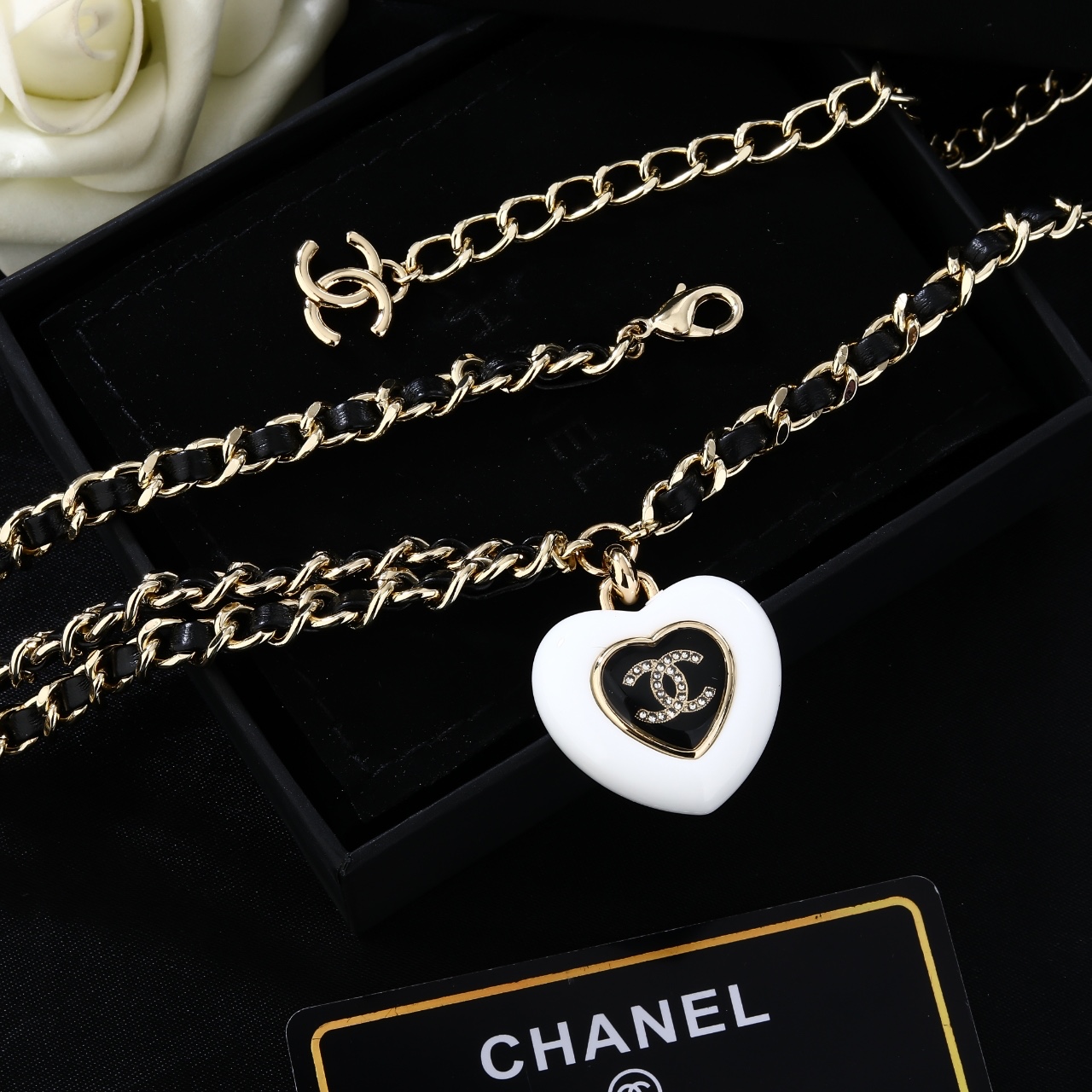 Chanel Goose Heart CC Pendant Waist Chain necklace Gold-tone metal black leather white resin heart pendant black enamel clear crystal accents 80cm with 10cm extender