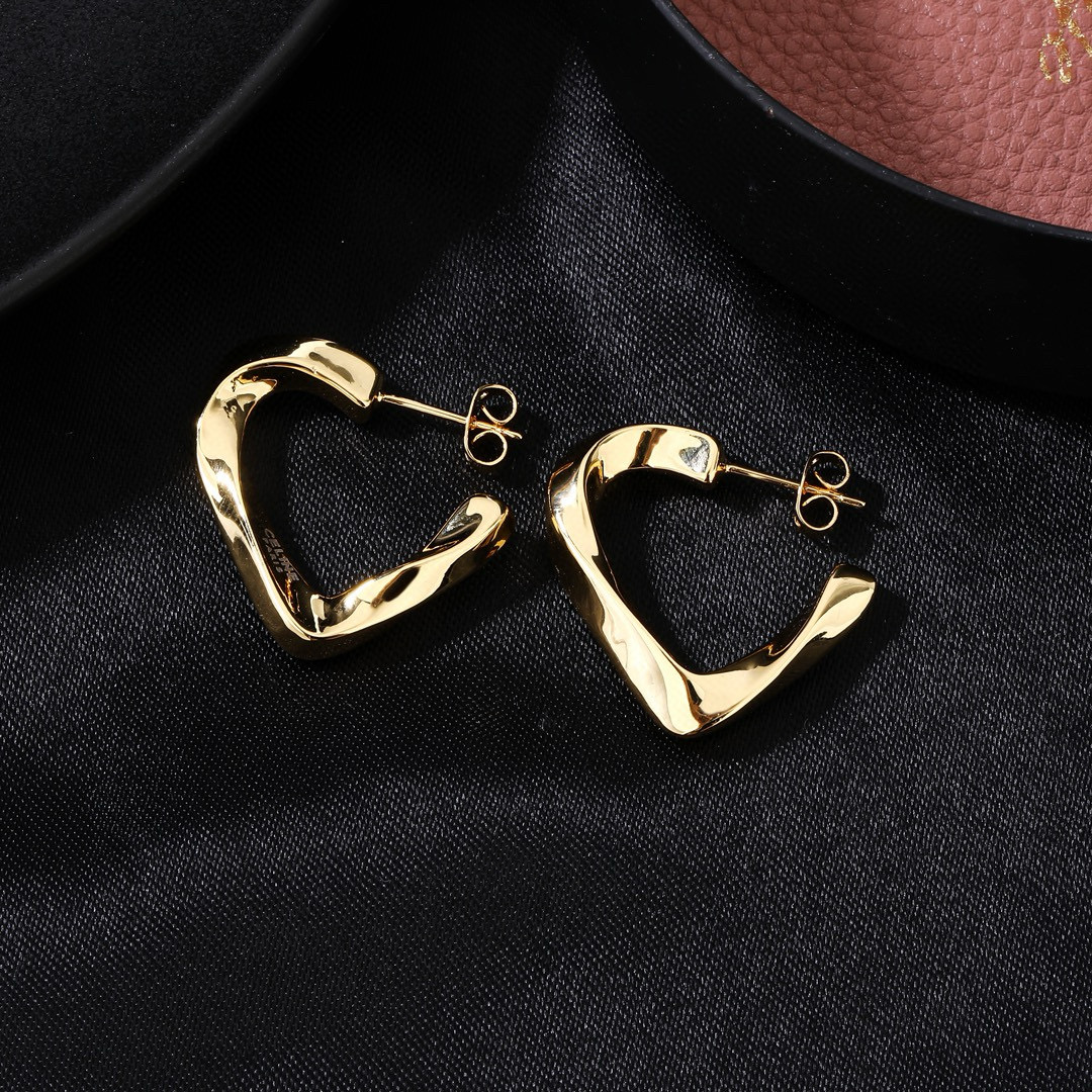 Celine Twisted Open Heart Hoop Earrings earrings polished gold-tone metal no accent stones 2 5cm hoop diameter