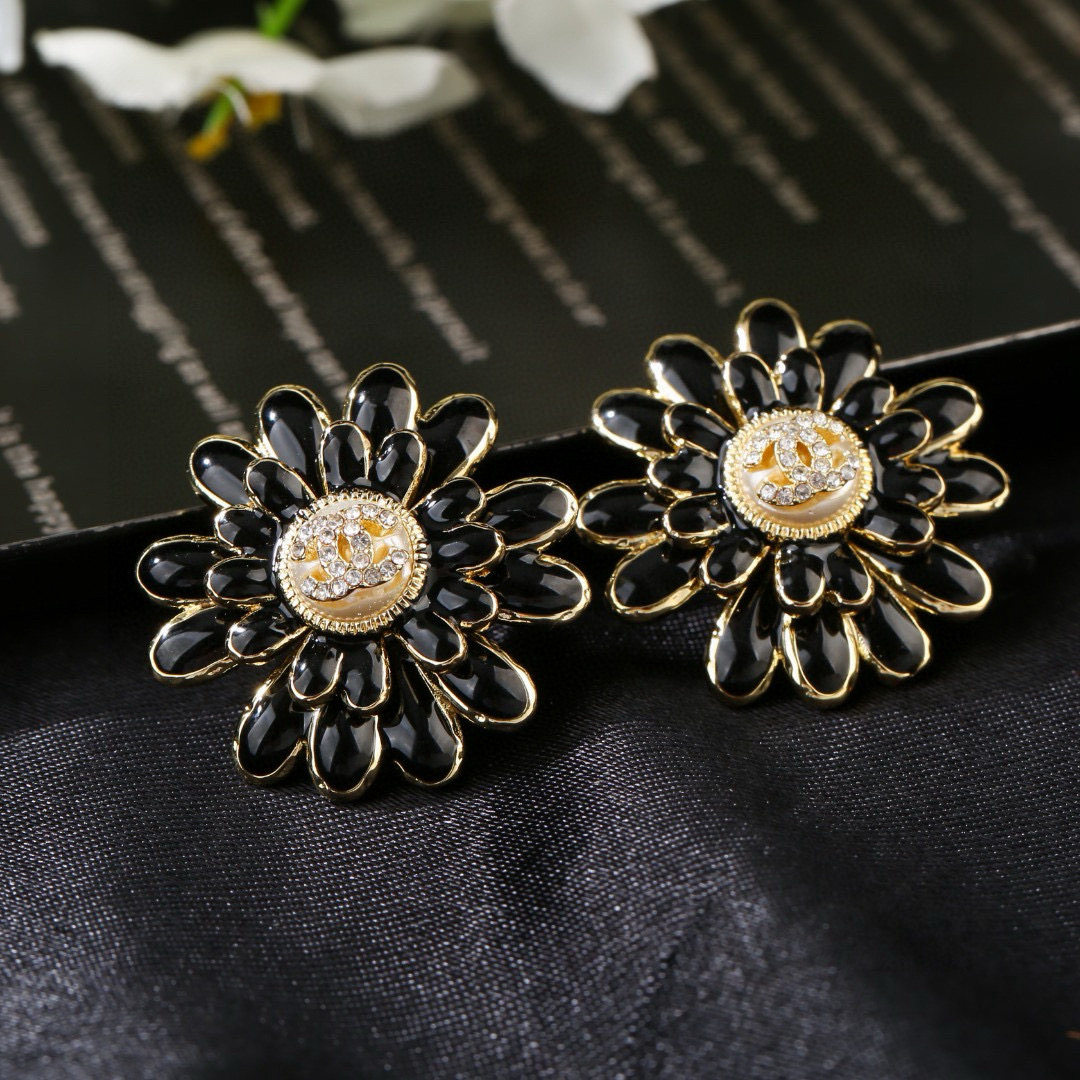 Chanel CC Daisy Stud Earrings earrings Gold-tone metal black enamel clear crystal accents faux pearl center detail 2 5cm diameter