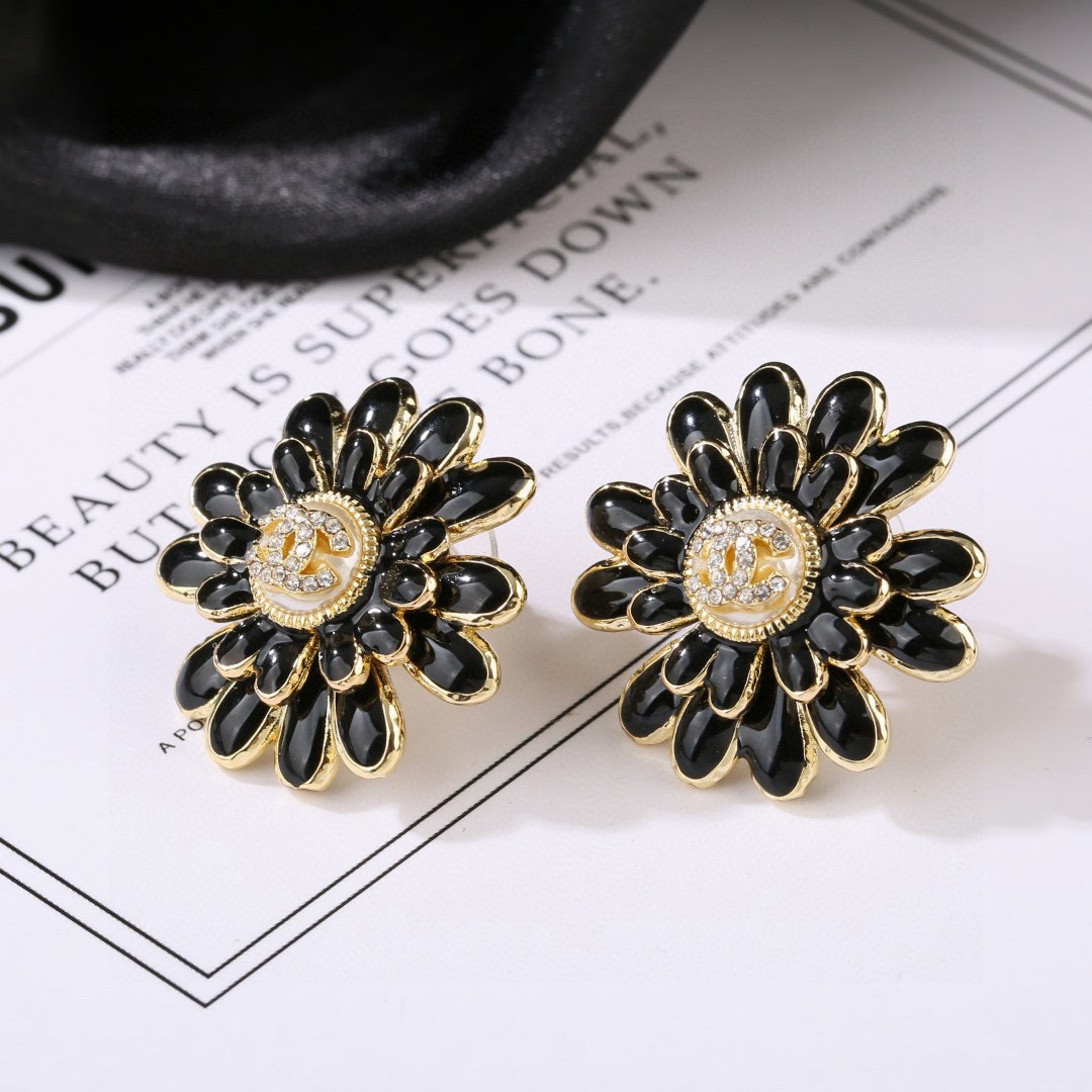Chanel CC Daisy Stud Earrings earrings Gold-tone metal black enamel clear crystal accents faux pearl center detail 2 5cm diameter