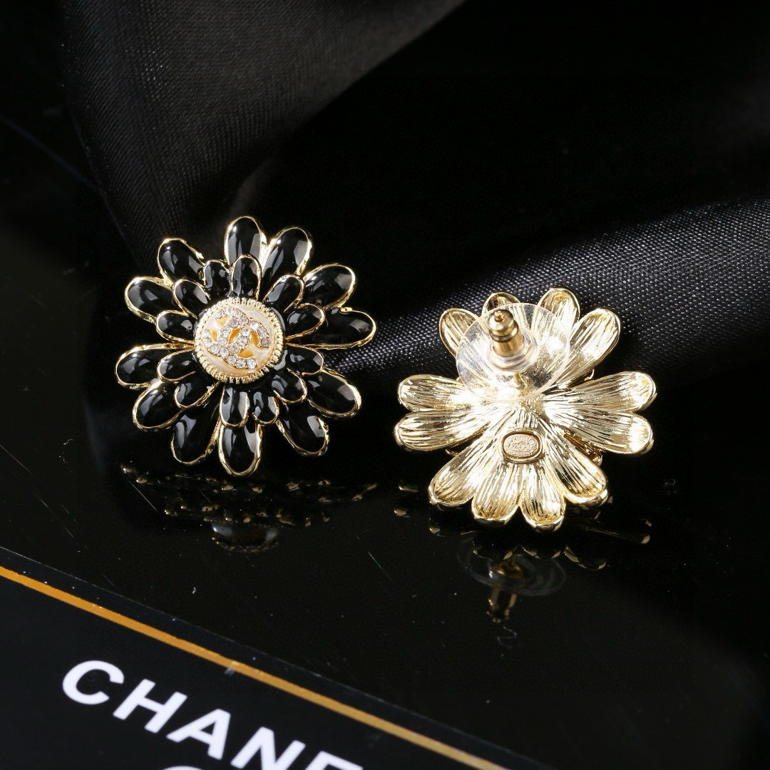 Chanel CC Daisy Stud Earrings earrings Gold-tone metal black enamel clear crystal accents faux pearl center detail 2 5cm diameter
