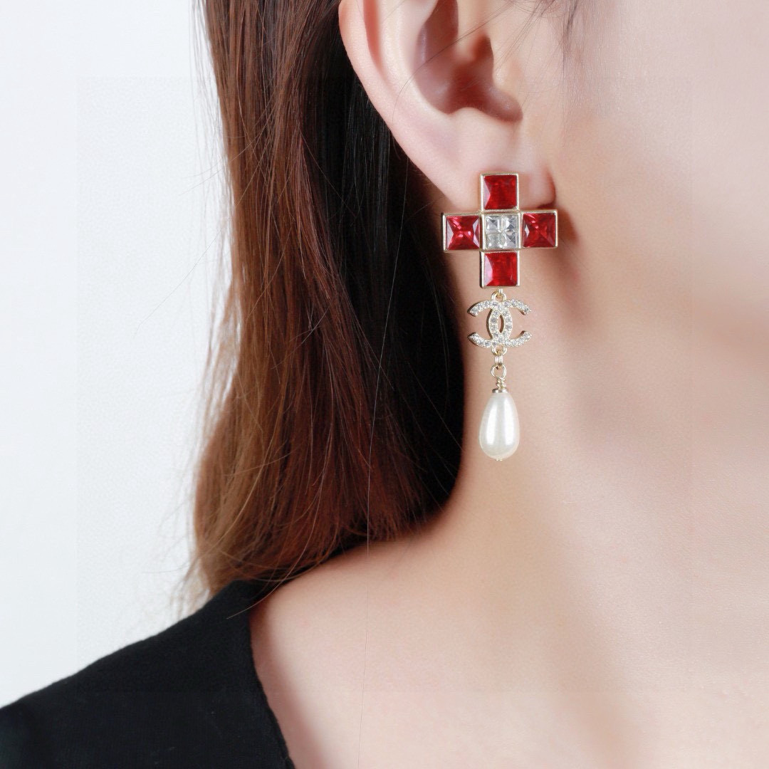 Chanel CC Cross Crystal Pearl Drop Earrings earrings Gold-tone metal with champagne clear crystals cream teardrop faux pearls variant with red crystals also exists 4 5cm drop length