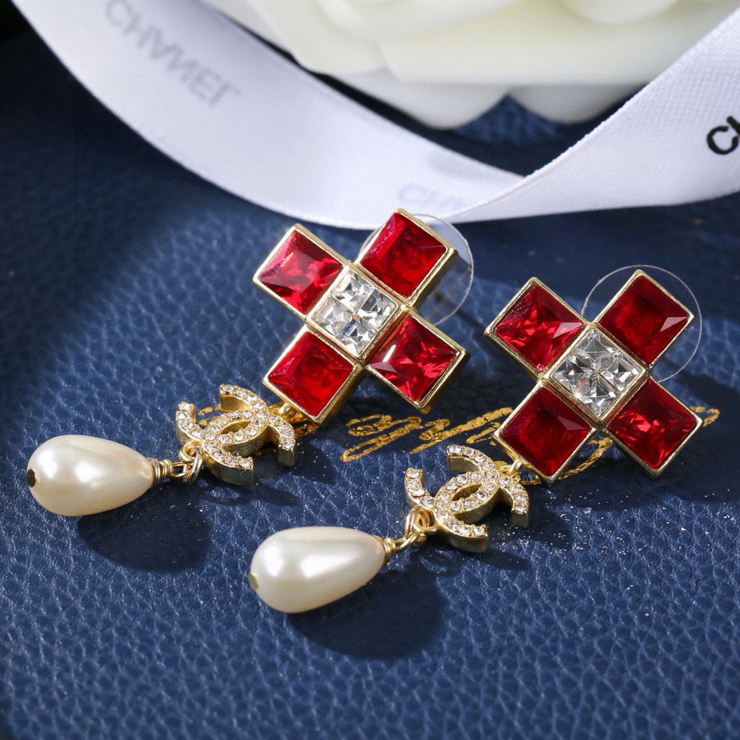 Chanel CC Cross Crystal Pearl Drop Earrings earrings Gold-tone metal with champagne clear crystals cream teardrop faux pearls variant with red crystals also exists 4 5cm drop length