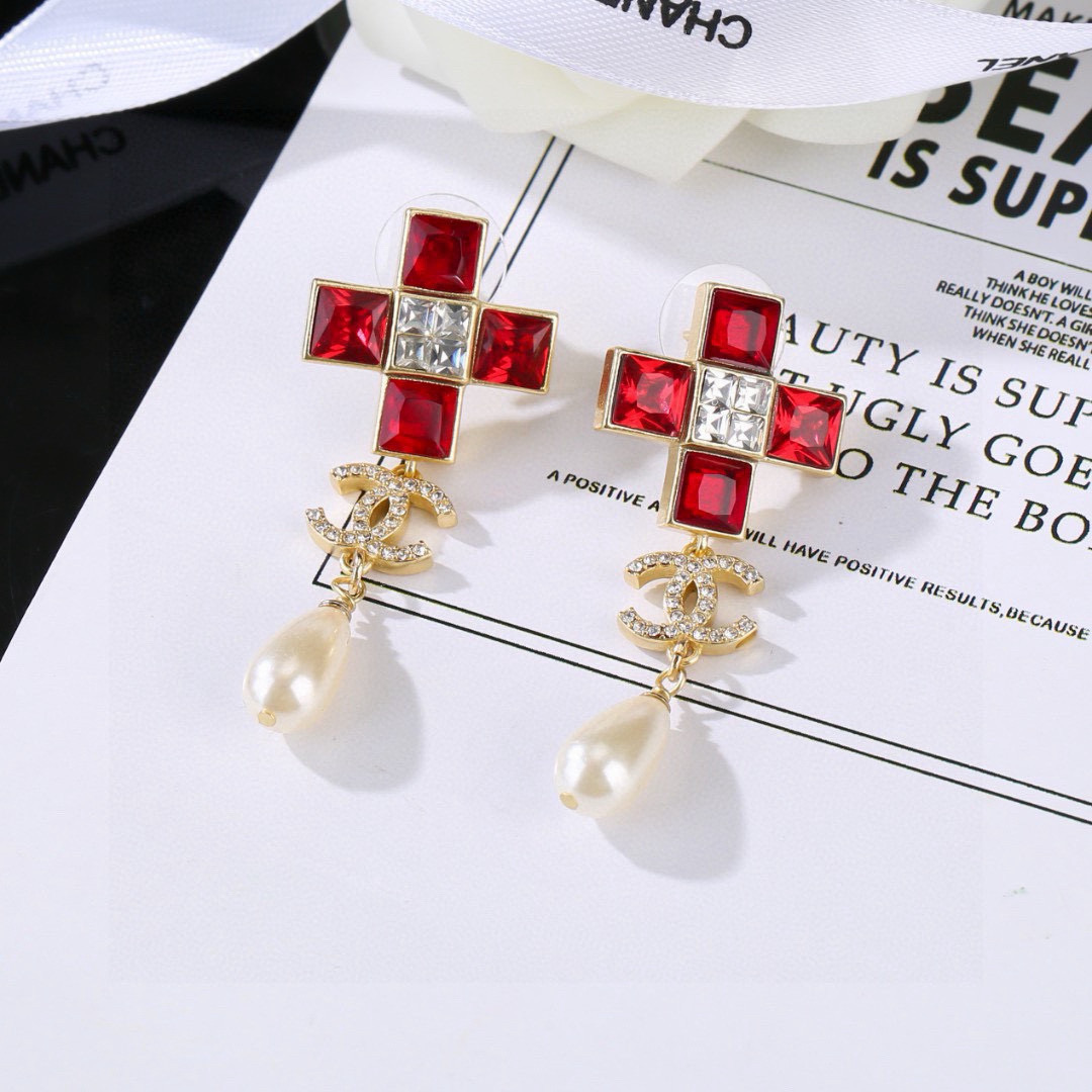 Chanel CC Cross Crystal Pearl Drop Earrings earrings Gold-tone metal with champagne clear crystals cream teardrop faux pearls variant with red crystals also exists 4 5cm drop length