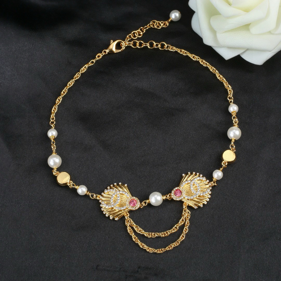 Chanel CC Shell Pearl Crystal Choker necklace gold tone metal white faux pearl clear crystal pink crystal 40cm with 5cm extender