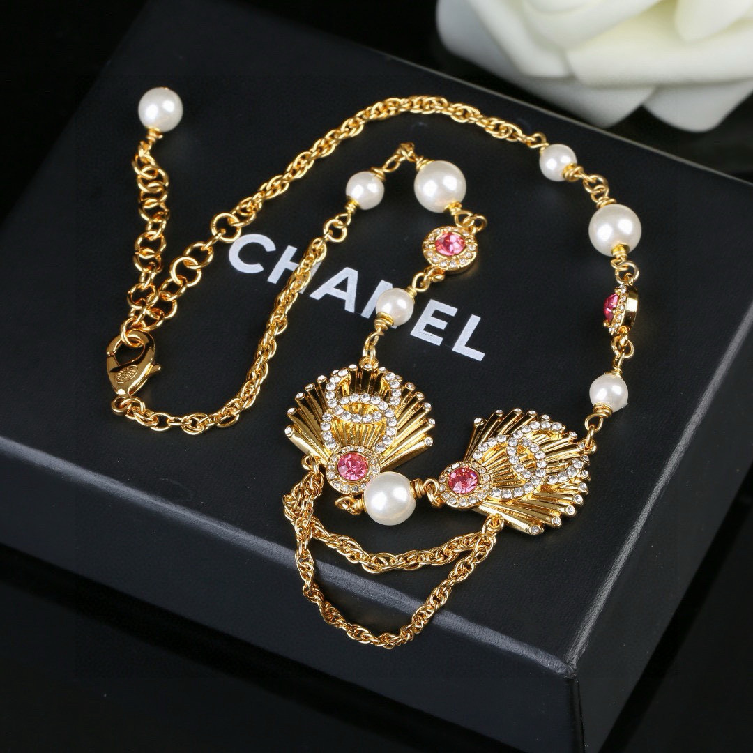 Chanel CC Shell Pearl Crystal Choker necklace gold tone metal white faux pearl clear crystal pink crystal 40cm with 5cm extender