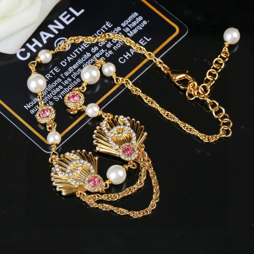 Chanel CC Shell Pearl Crystal Choker necklace gold tone metal white faux pearl clear crystal pink crystal 40cm with 5cm extender