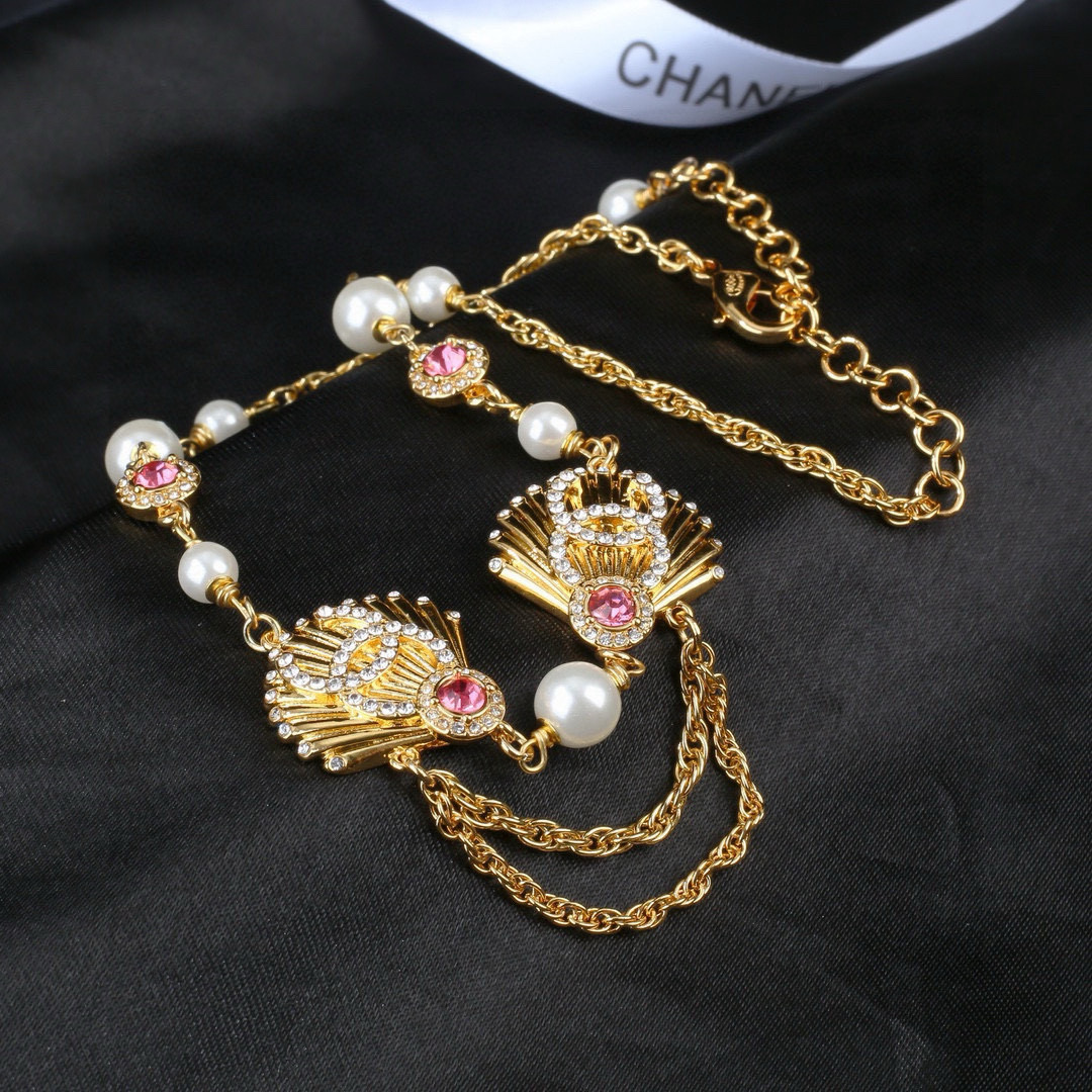 Chanel CC Shell Pearl Crystal Choker necklace gold tone metal white faux pearl clear crystal pink crystal 40cm with 5cm extender