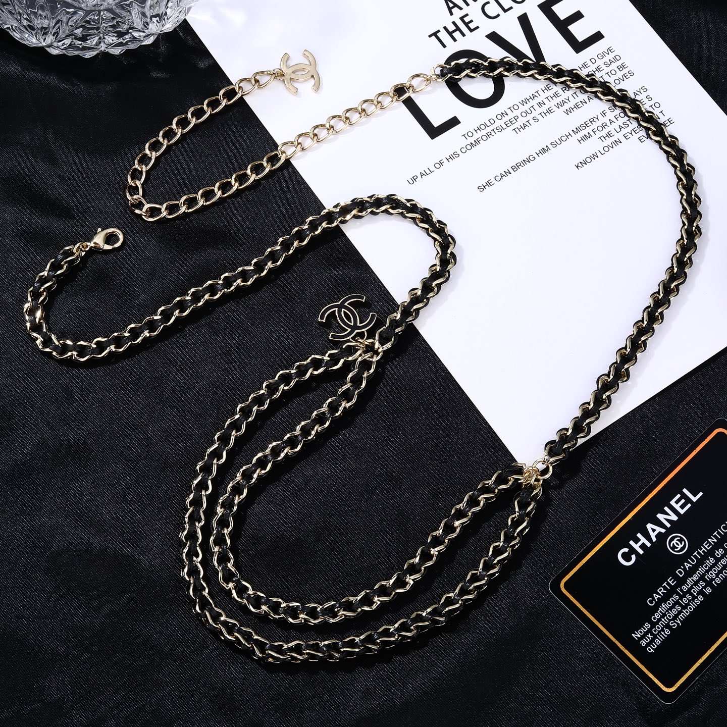 Chanel CC Logo 2026 Spring Summer Preview Collection necklace Gold tone metal with black lambskin leather black enamel CC logo charm 80cm