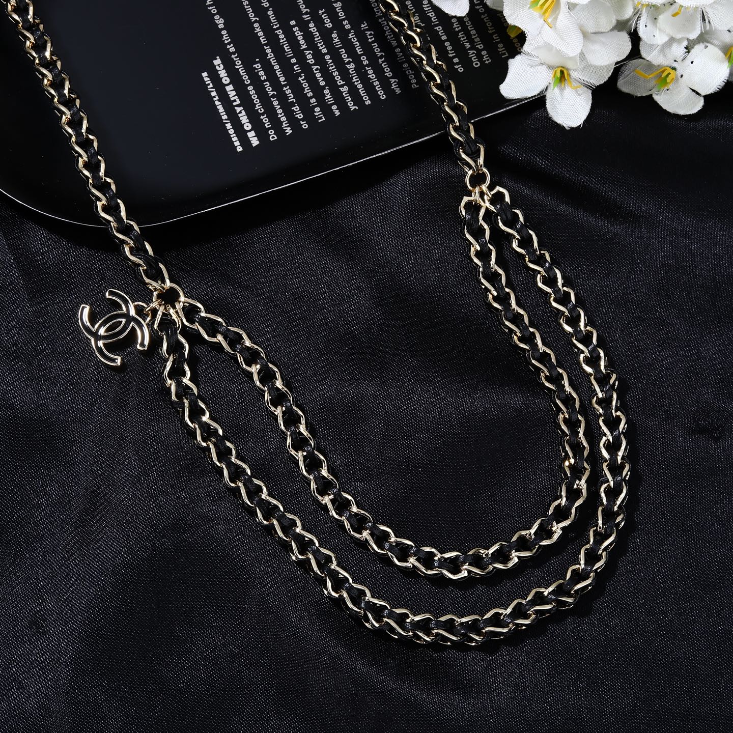 Chanel CC Logo 2026 Spring Summer Preview Collection necklace Gold tone metal with black lambskin leather black enamel CC logo charm 80cm