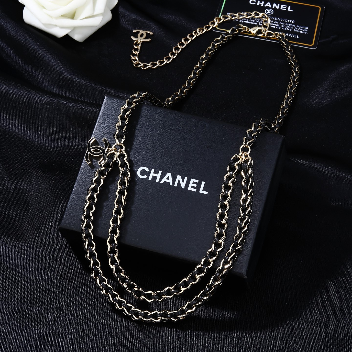 Chanel CC Logo 2026 Spring Summer Preview Collection necklace Gold tone metal with black lambskin leather black enamel CC logo charm 80cm