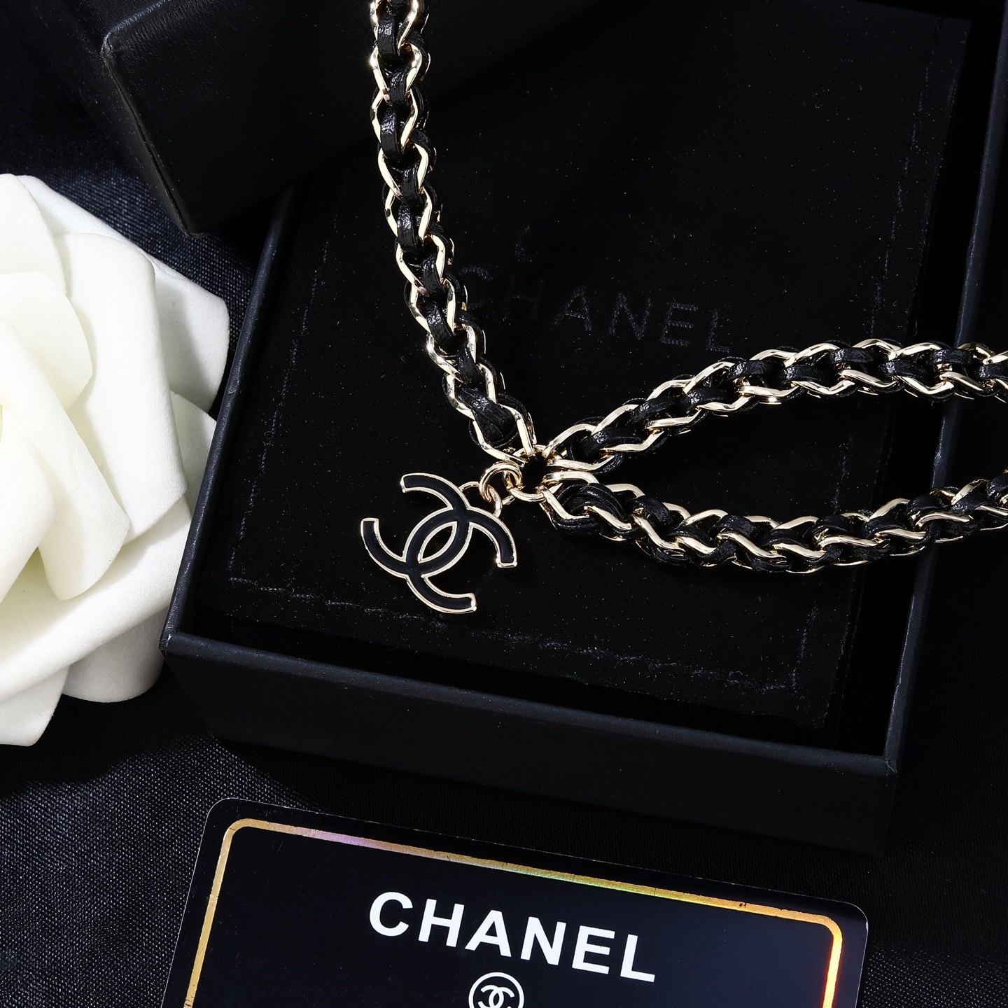 Chanel CC Logo 2026 Spring Summer Preview Collection necklace Gold tone metal with black lambskin leather black enamel CC logo charm 80cm