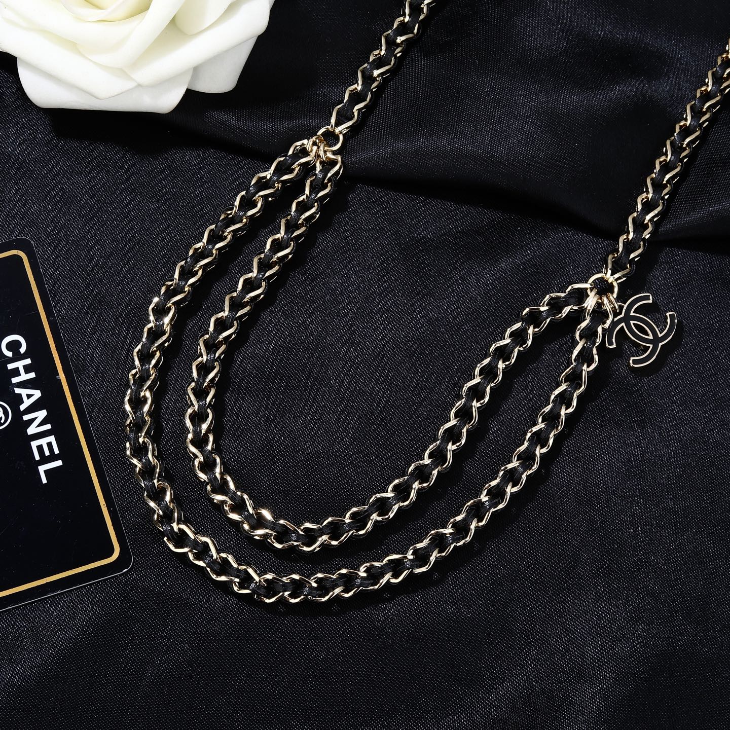 Chanel CC Logo 2026 Spring Summer Preview Collection necklace Gold tone metal with black lambskin leather black enamel CC logo charm 80cm