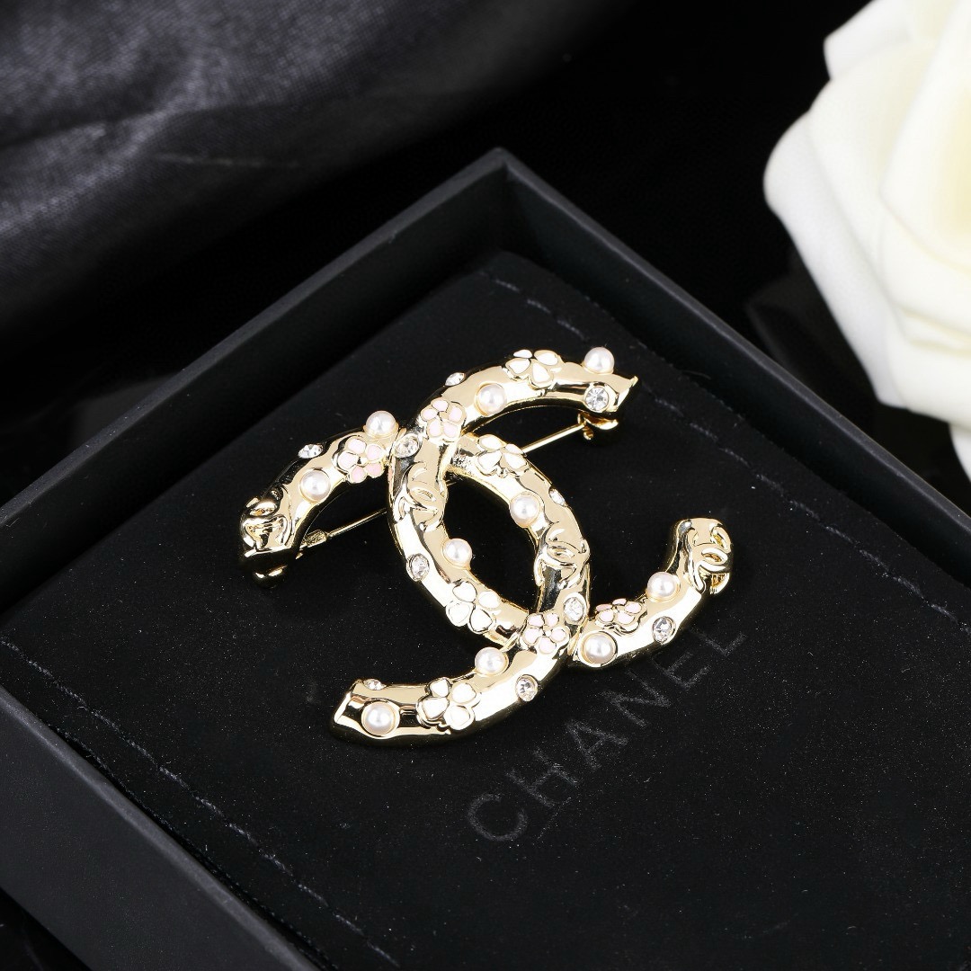Chanel CC Logo Floral Pearl Crystal Brooch brooch gold tone metal white faux pearl clear crystal pink and white enamel floral accents 3 5cm width