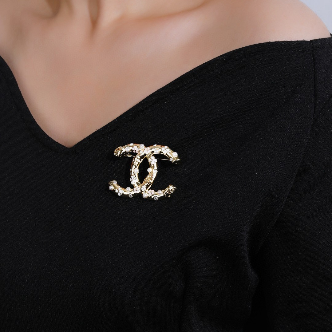 Chanel CC Logo Floral Pearl Crystal Brooch brooch gold tone metal white faux pearl clear crystal pink and white enamel floral accents 3 5cm width