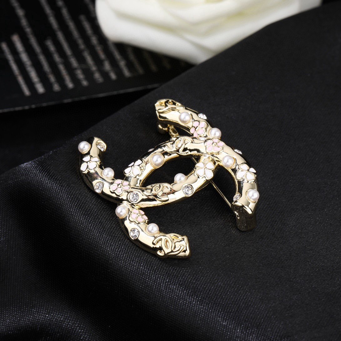 Chanel CC Logo Floral Pearl Crystal Brooch brooch gold tone metal white faux pearl clear crystal pink and white enamel floral accents 3 5cm width