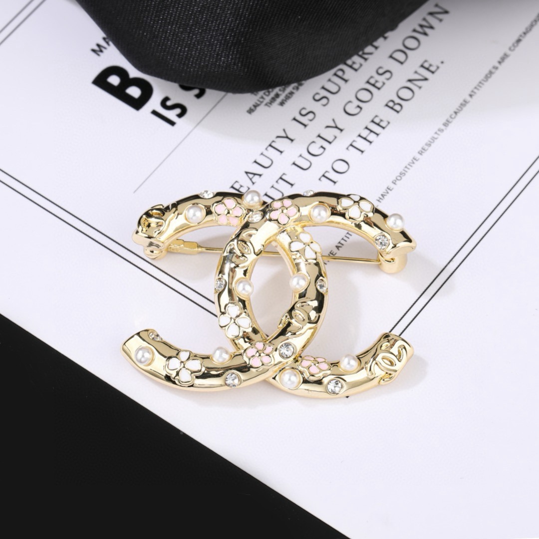 Chanel CC Logo Floral Pearl Crystal Brooch brooch gold tone metal white faux pearl clear crystal pink and white enamel floral accents 3 5cm width