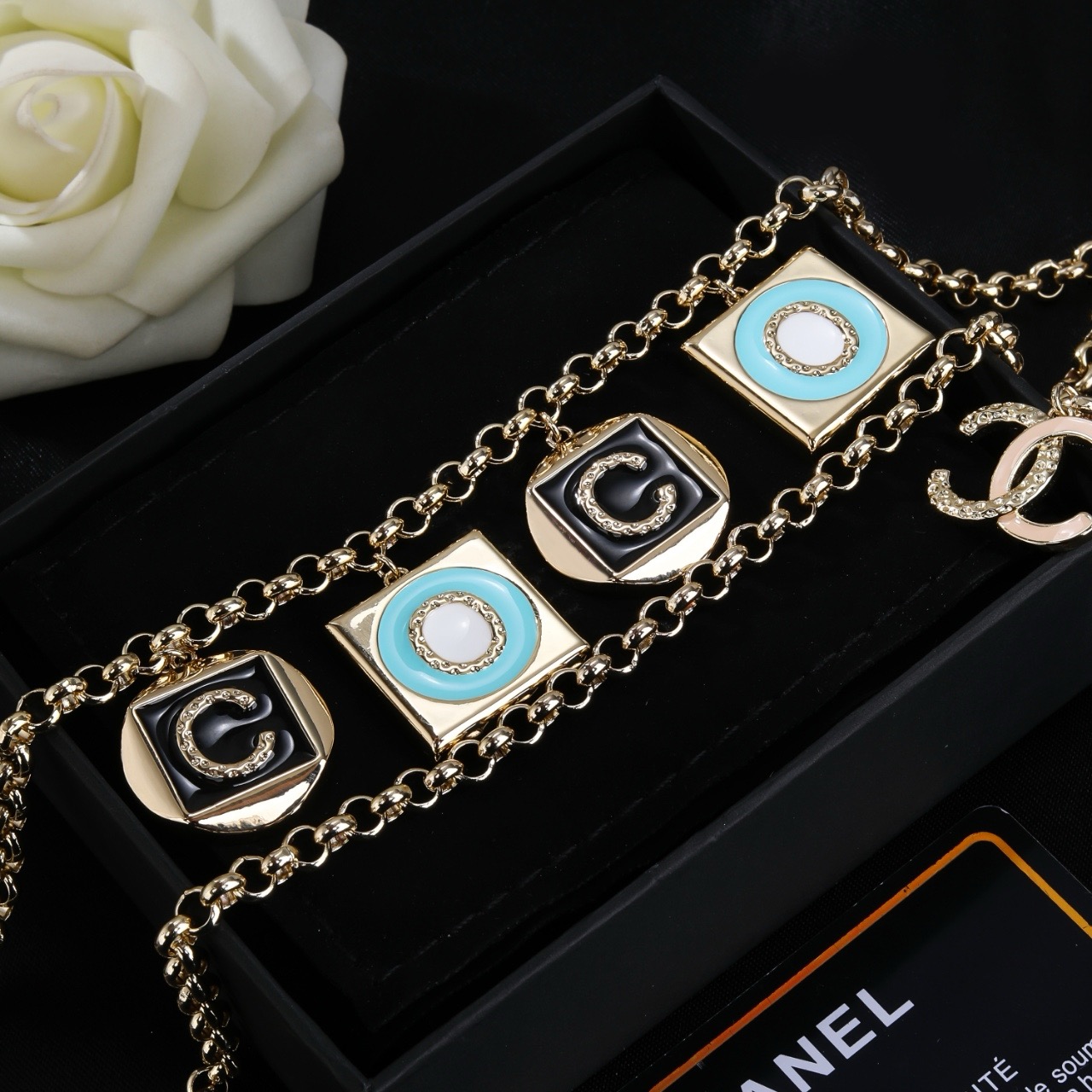 Chanel Coco Charms Double Chain necklace Light gold tone metal black enamel turquoise blue enamel white enamel clear crystal accents 80cm with 10cm extension