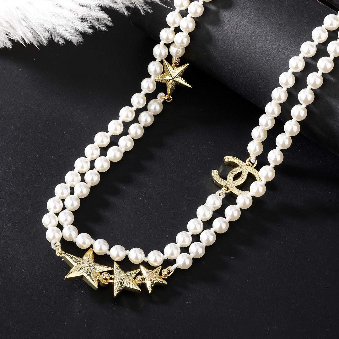 Chanel CC Logo Star Pearl Long Necklace necklace Gold-tone metal white faux pearls clear crystals pink opalescent cabochons 80cm with 5cm extender chain