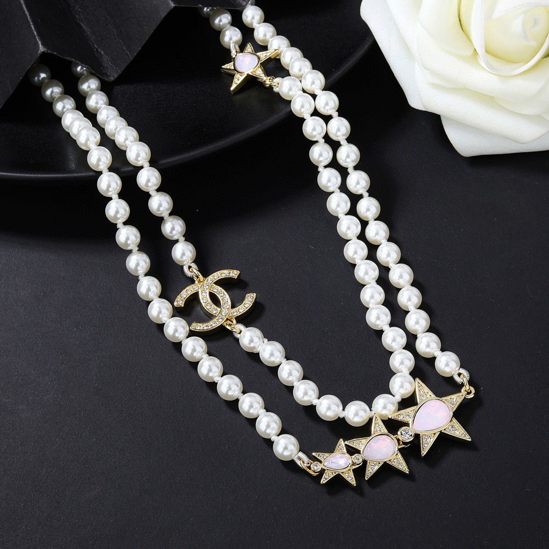 Chanel CC Logo Star Pearl Long Necklace necklace Gold-tone metal white faux pearls clear crystals pink opalescent cabochons 80cm with 5cm extender chain