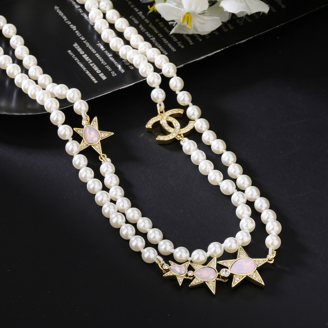 Chanel CC Logo Star Pearl Long Necklace necklace Gold-tone metal white faux pearls clear crystals pink opalescent cabochons 80cm with 5cm extender chain