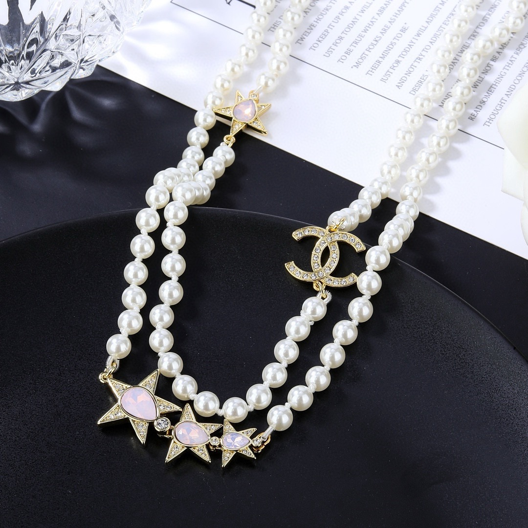 Chanel CC Logo Star Pearl Long Necklace necklace Gold-tone metal white faux pearls clear crystals pink opalescent cabochons 80cm with 5cm extender chain