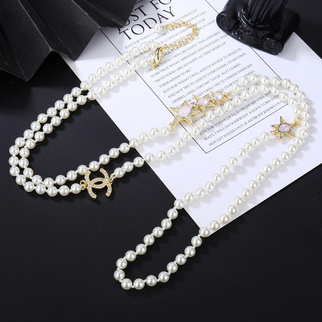 Chanel CC Logo Star Pearl Long Necklace necklace Gold-tone metal white faux pearls clear crystals pink opalescent cabochons 80cm with 5cm extender chain