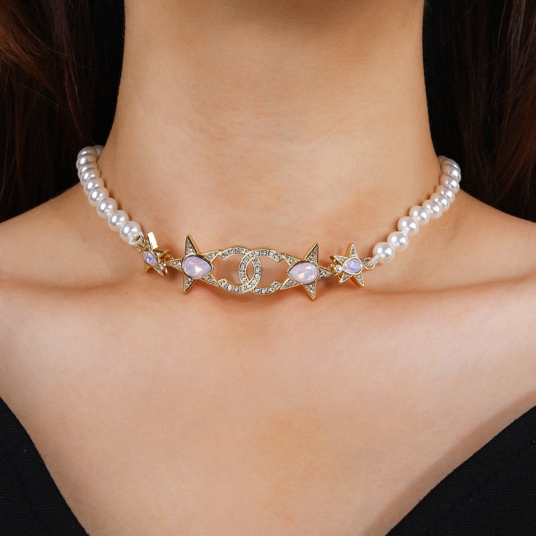 Chanel CC Star Pearl Choker necklace Gold-tone metal white faux pearls clear crystals opalescent pink accent stones 38cm with 5cm extender