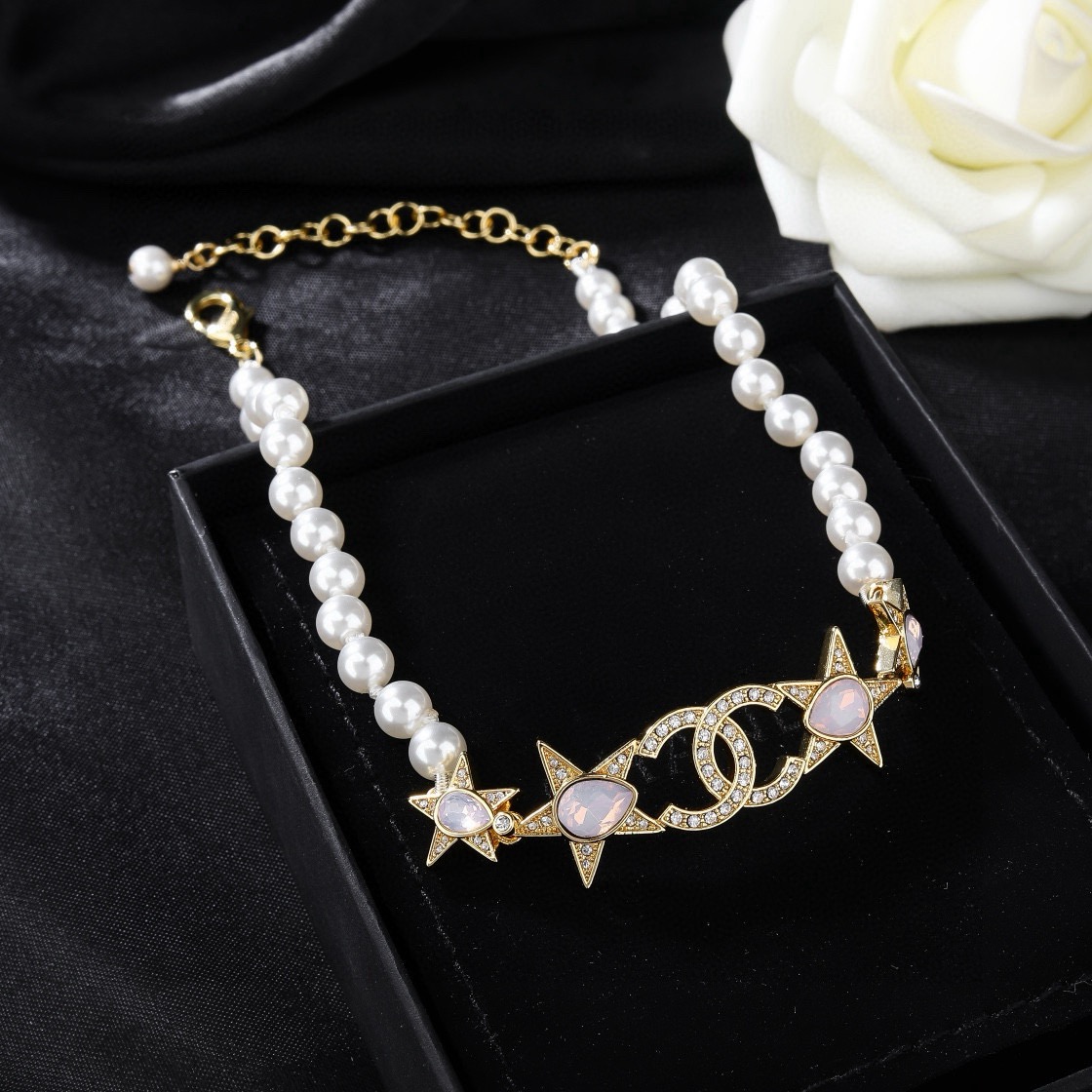 Chanel CC Star Pearl Choker necklace Gold-tone metal white faux pearls clear crystals opalescent pink accent stones 38cm with 5cm extender