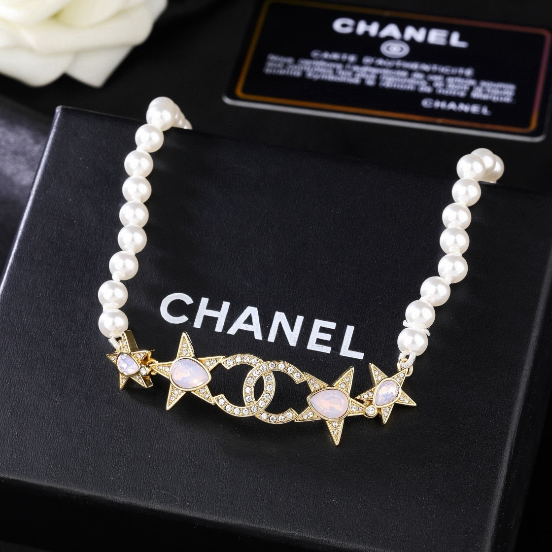 Chanel CC Star Pearl Choker necklace Gold-tone metal white faux pearls clear crystals opalescent pink accent stones 38cm with 5cm extender