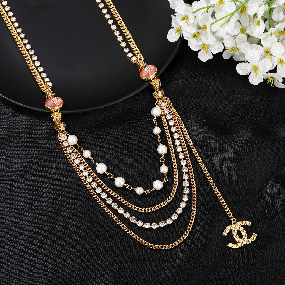 Chanel CC Logo Multi-Strand Pearl Crystal Waist Chain necklace Gold-tone metal white faux pearl clear crystal coral pink enamel 85cm