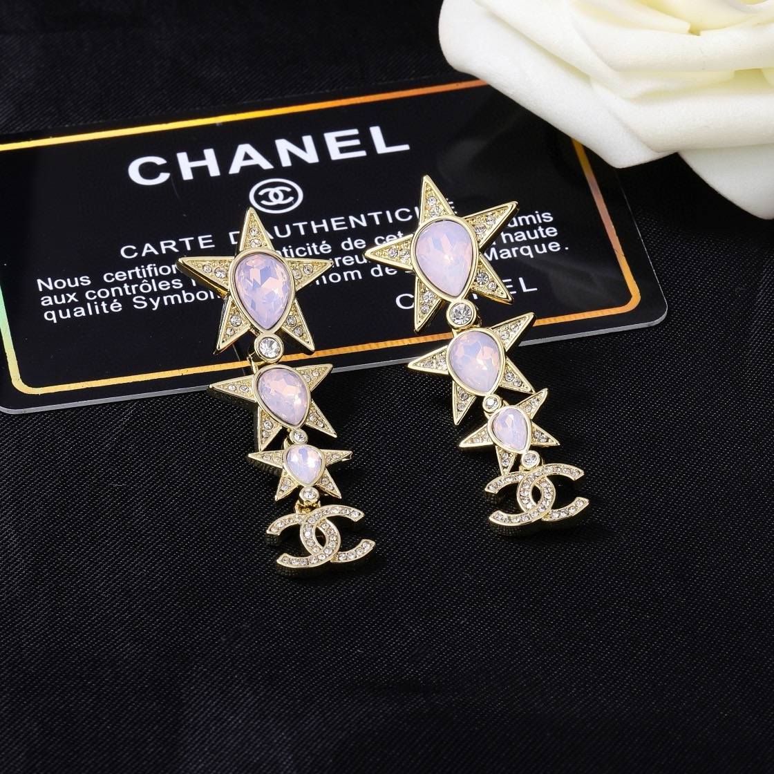 Chanel 23C CC Star Drop Earrings earrings gold-tone metal with pale pink opalescent teardrop stones and clear crystal accents 5 5cm drop length