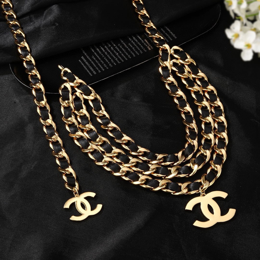 Chanel CC Logo Leather Woven Chain Belt necklace Gold-tone metal with black leather interwoven gold CC logo charms 105cm