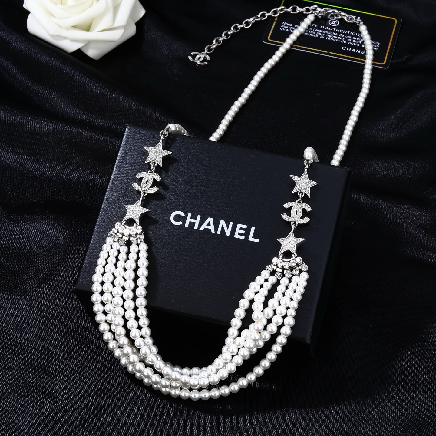 Chanel CC Logo Star Multi-Strand Pearl necklace silver-tone metal white faux pearl clear crystal 42cm with 5cm extender chain