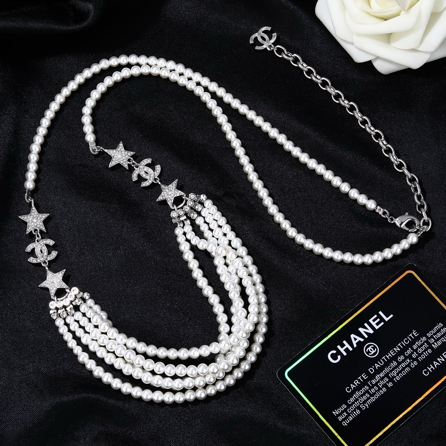 Chanel CC Logo Star Multi-Strand Pearl necklace silver-tone metal white faux pearl clear crystal 42cm with 5cm extender chain
