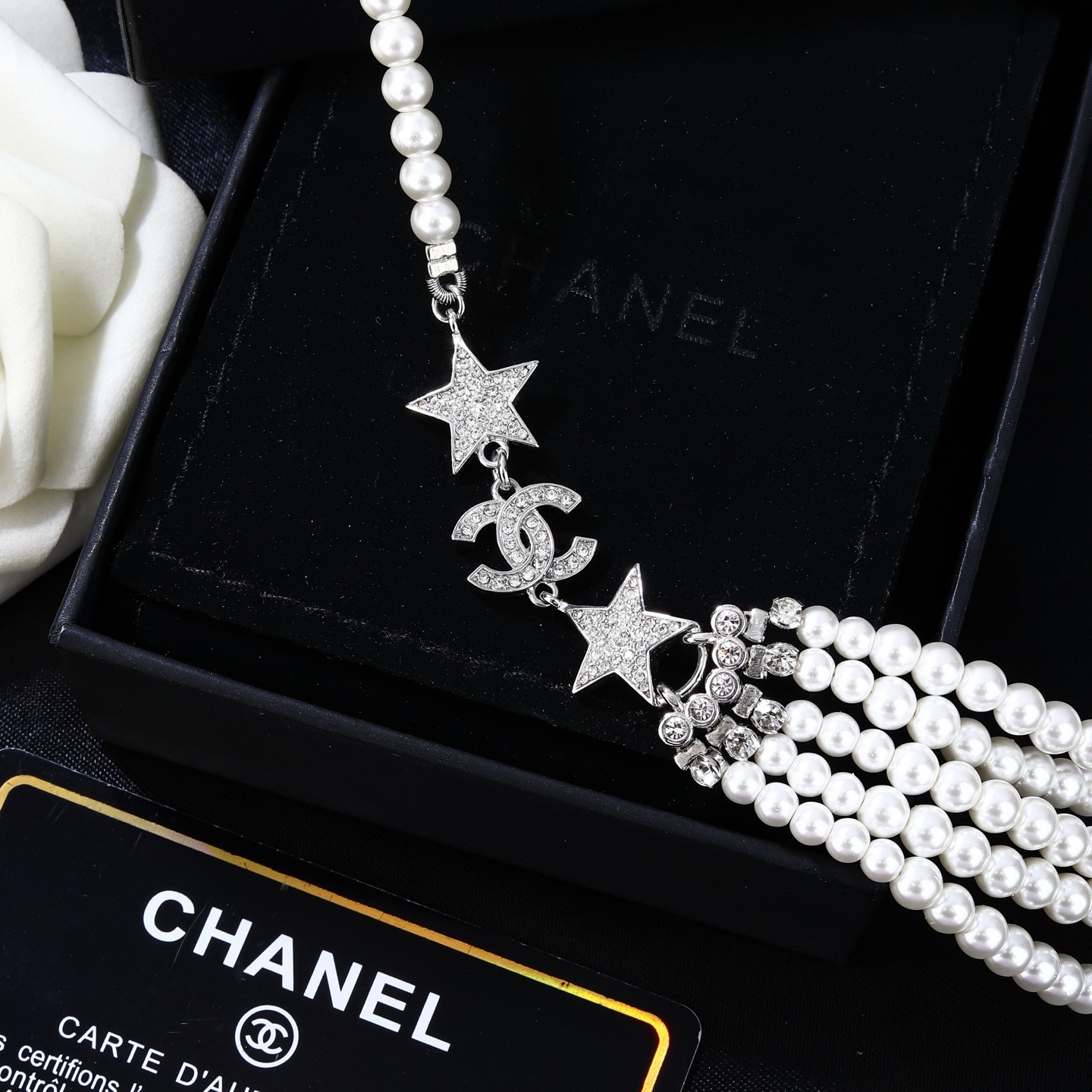 Chanel CC Logo Star Multi-Strand Pearl necklace silver-tone metal white faux pearl clear crystal 42cm with 5cm extender chain