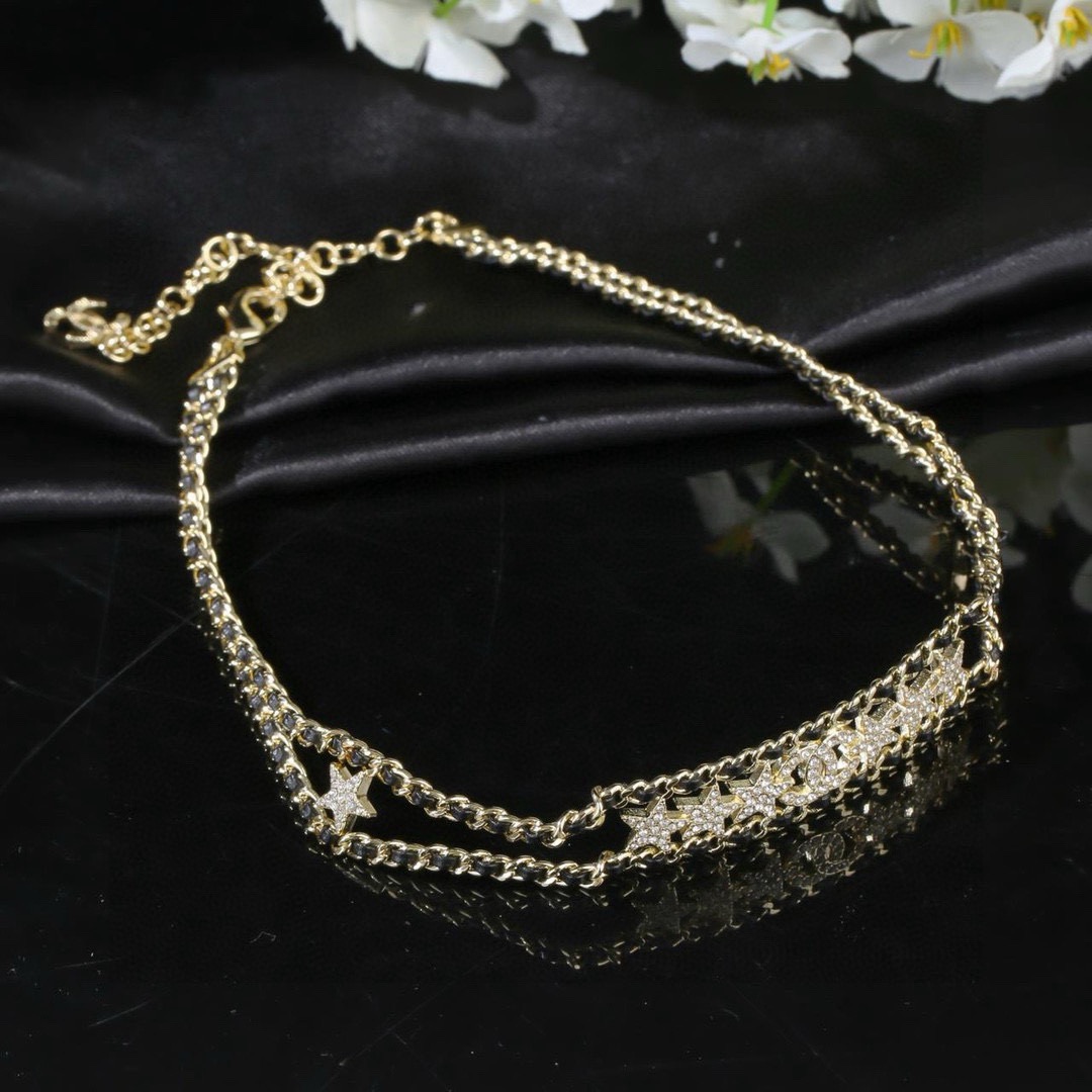 Chanel CC Star Crystal Leather Woven Choker necklace Gold-tone metal black leather clear crystal 38cm with 5cm extender