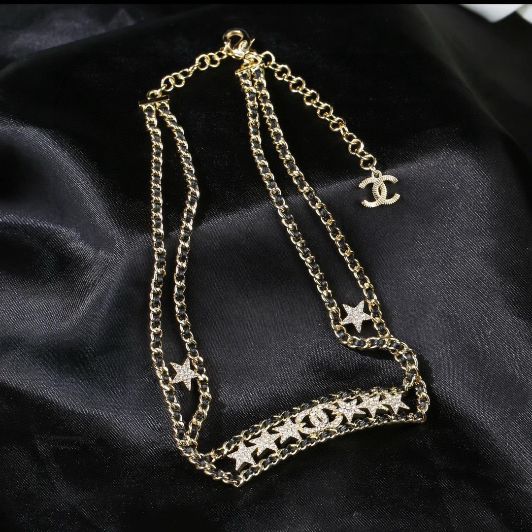 Chanel CC Star Crystal Leather Woven Choker necklace Gold-tone metal black leather clear crystal 38cm with 5cm extender