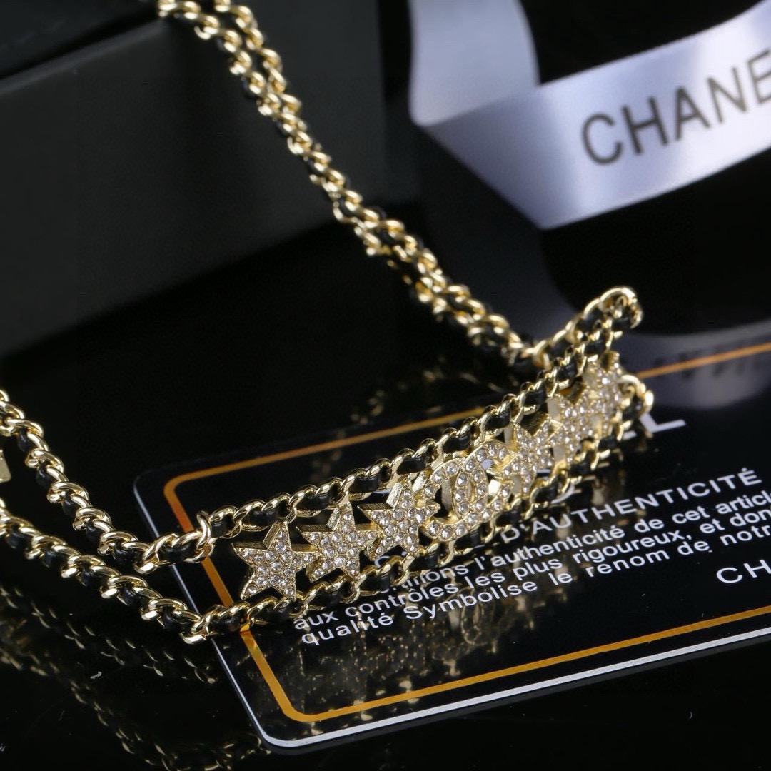 Chanel CC Star Crystal Leather Woven Choker necklace Gold-tone metal black leather clear crystal 38cm with 5cm extender