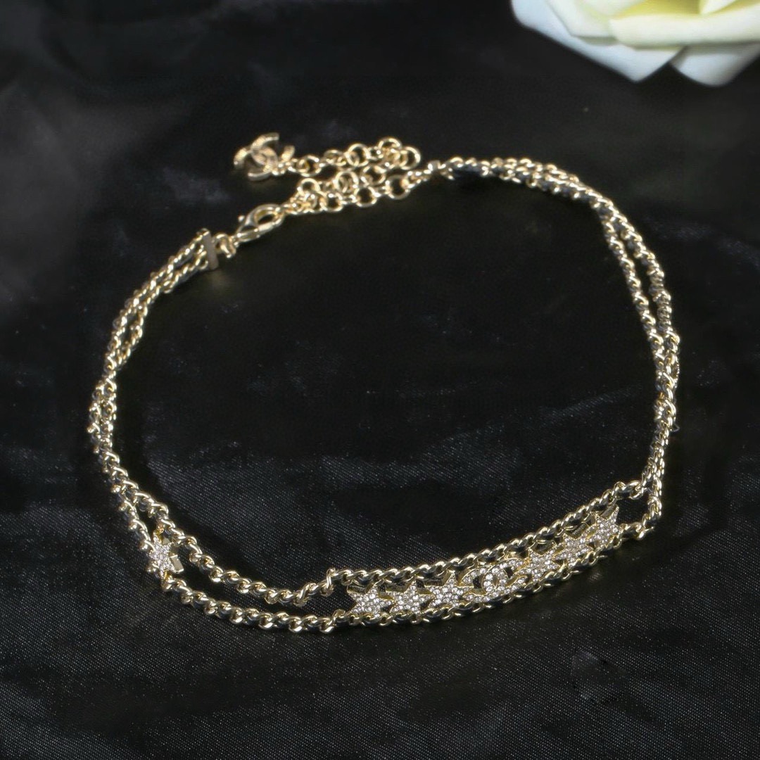 Chanel CC Star Crystal Leather Woven Choker necklace Gold-tone metal black leather clear crystal 38cm with 5cm extender