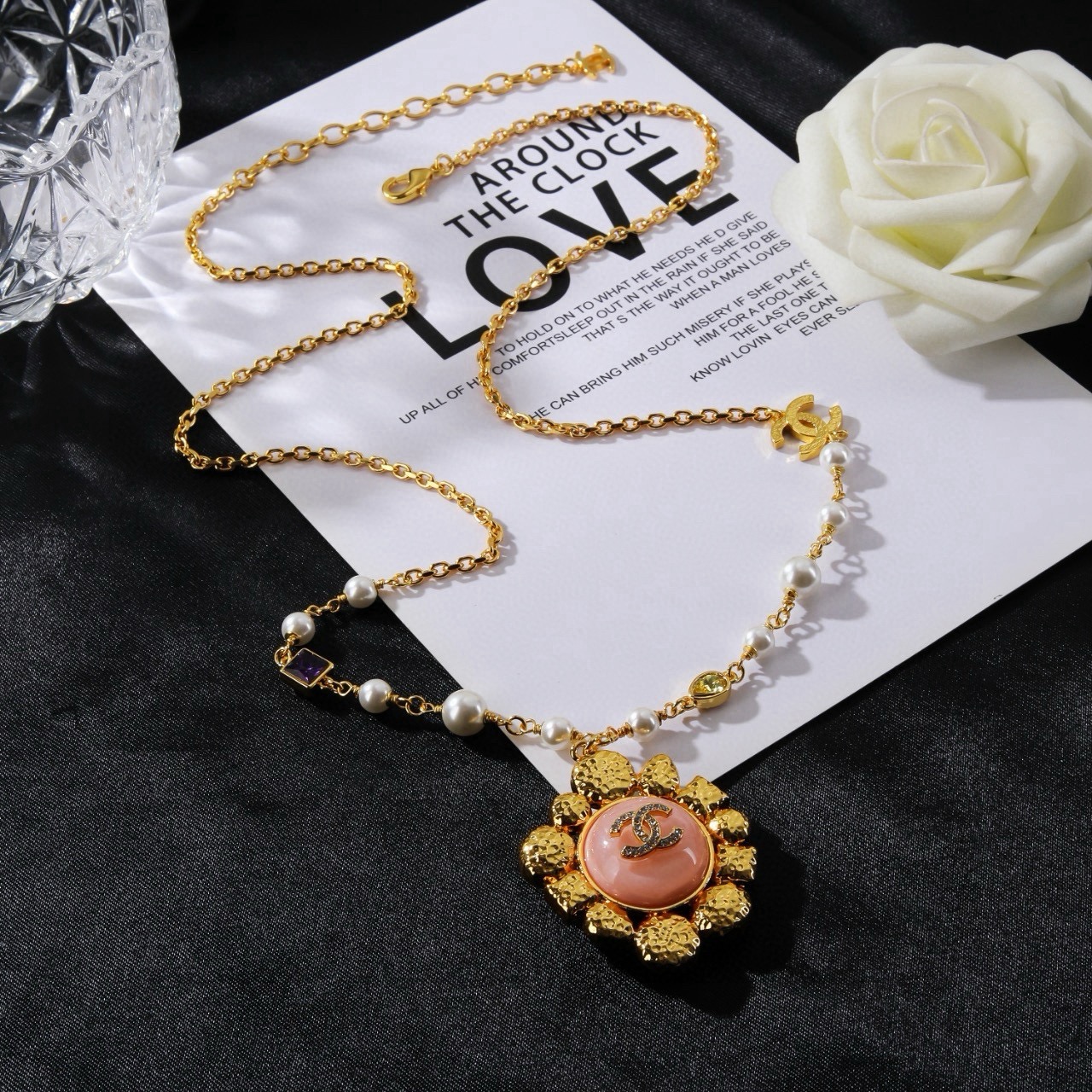 Chanel CC Logo Multicolor Gemstone Pearl Sun Pendant Necklace necklace Gold-tone metal with white pearls purple red green yellow clear pink and white gemstones 60cm