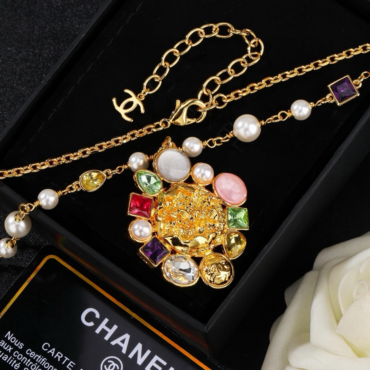 Chanel CC Logo Multicolor Gemstone Pearl Sun Pendant Necklace necklace Gold-tone metal with white pearls purple red green yellow clear pink and white gemstones 60cm