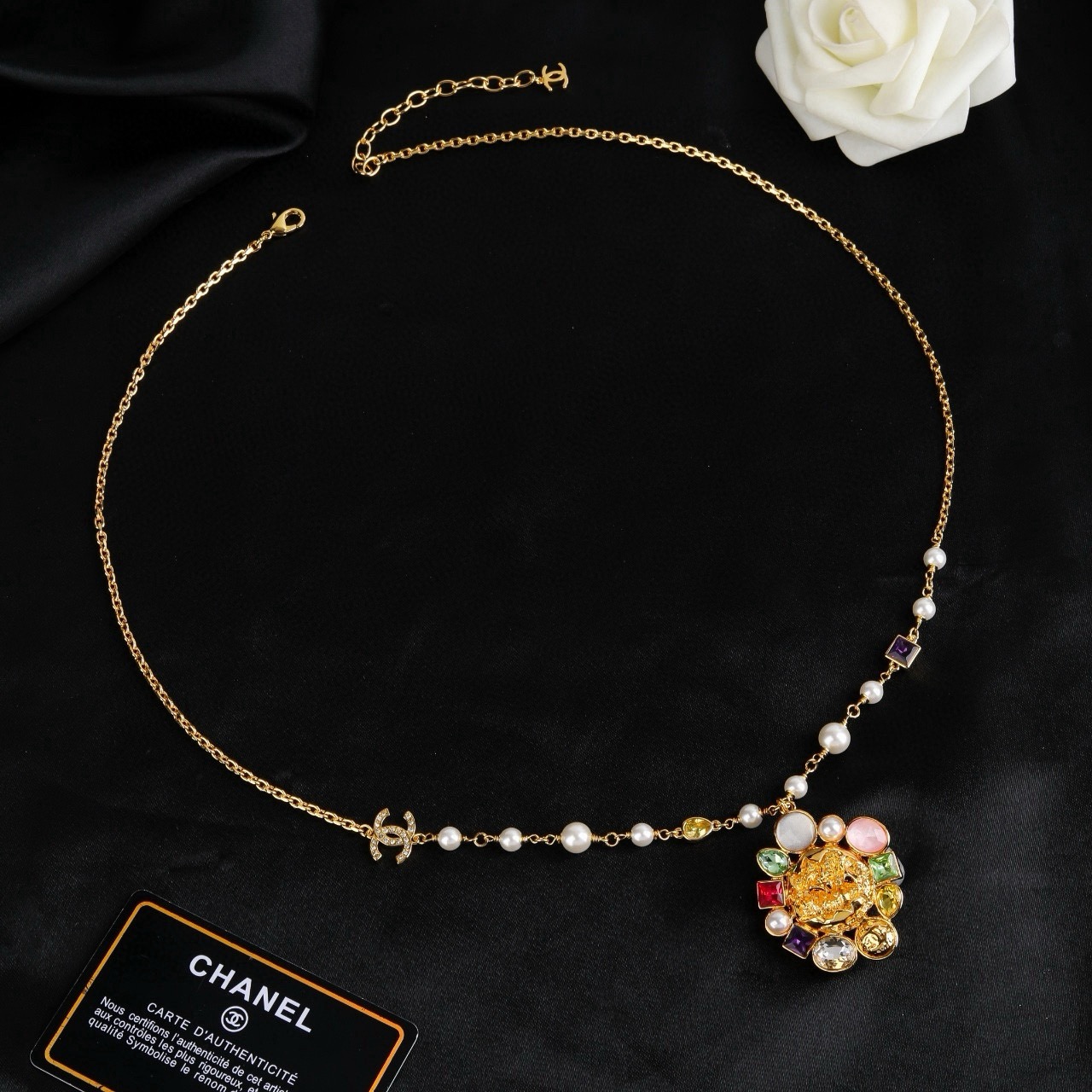 Chanel CC Logo Multicolor Gemstone Pearl Sun Pendant Necklace necklace Gold-tone metal with white pearls purple red green yellow clear pink and white gemstones 60cm