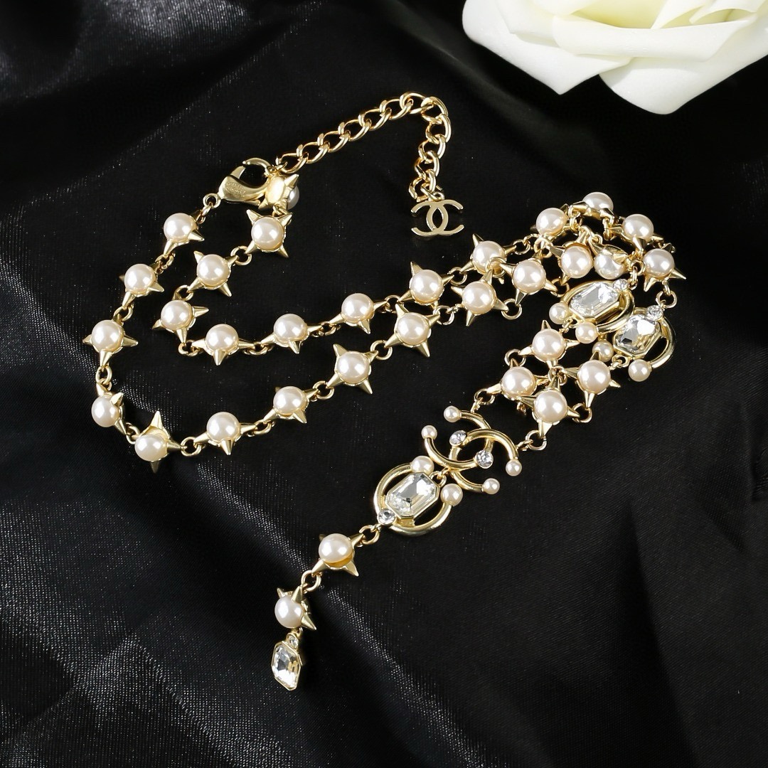 Chanel 2021 CC Logo Star Pearl Crystal Lariat Necklace necklace gold-tone metal white pearl clear crystal 40cm with 5cm extender