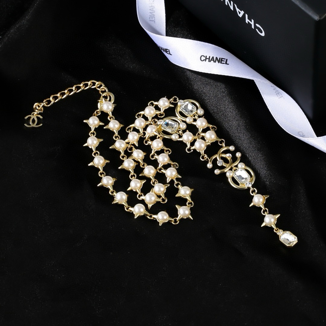 Chanel 2021 CC Logo Star Pearl Crystal Lariat Necklace necklace gold-tone metal white pearl clear crystal 40cm with 5cm extender